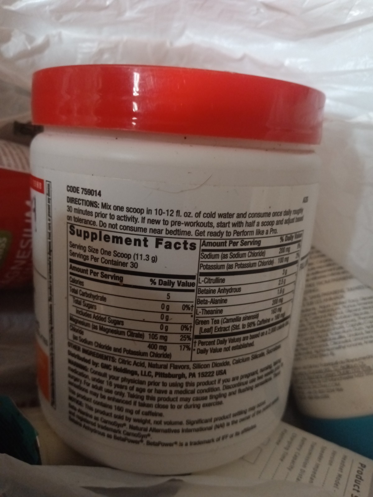 GNC pro pre-workout tropical fruit punch 11.96oz 4/26 R1C
